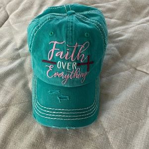 Women cap teal “faith over everything “